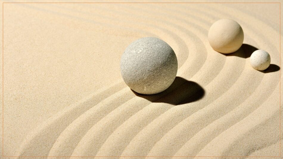 Bolas de 3 tamanhos, na areia de praia, criando pequenas ondas. Ilustra o texto Características das pessoas autistas.