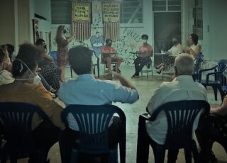 Casa Tina Martins e as mulheres PCDs. Foto das palestrantes e do público.