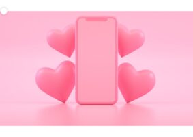 Foto com fundo rosa claro, ao centro, um celular e apoiados nele, dois corações de cada lado. Ilustra o texto Geração Z em perigo.